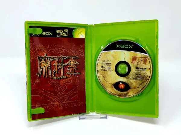 Interior del juego Magatama (JAP) para XBOX con disco y manual