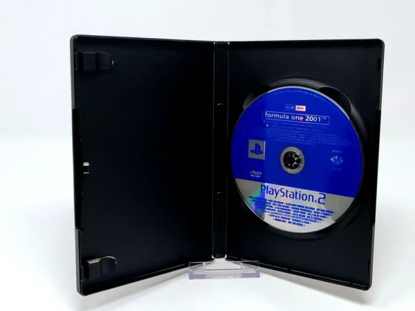 Interior del juego Formula One 2001 (UK) (Promo) para PlayStation 2 con disco y manual