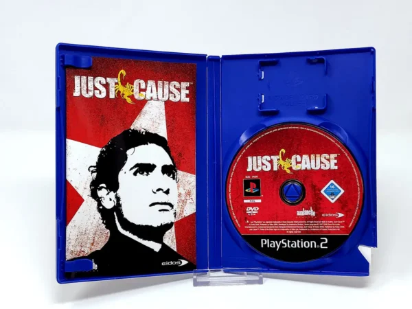 Interior del juego Just Cause (FRA) para PlayStation 2 con disco y manual