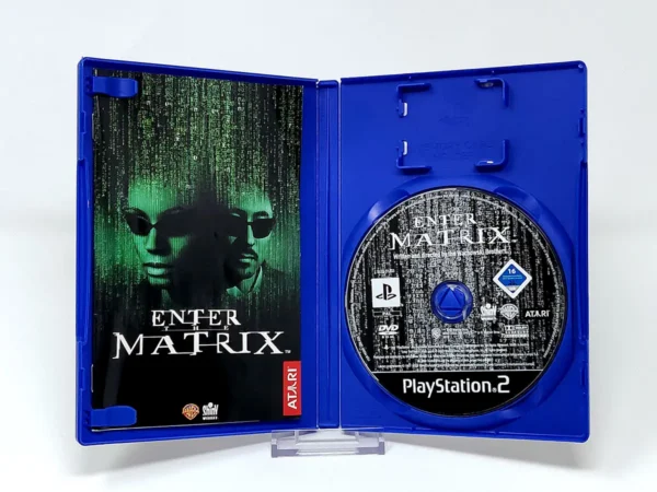 Interior del juego Enter the Matrix (ESP) para PlayStation 2 con disco y manual