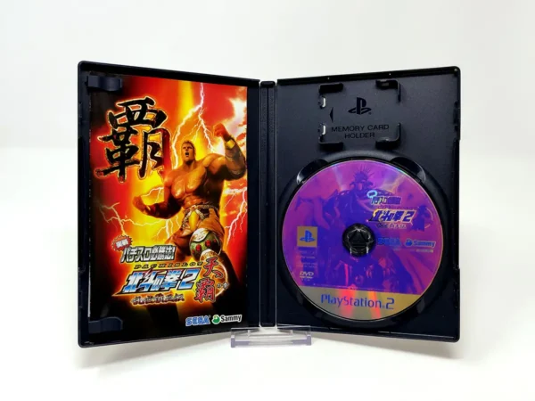 Interior del juego Jissen Pachi-Slot Hisshouhou! Hokuto no Ken 2: Ransei Haouden: Tenha no Shou (JAP) para PlayStation 2 con disco y manual
