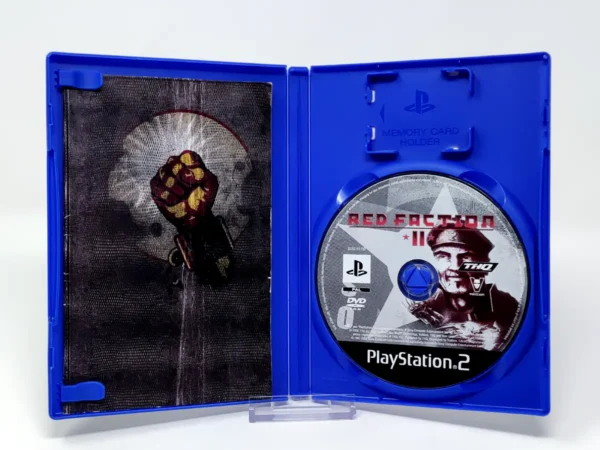 Interior del juego Red Faction II (ESP) para PlayStation 2 con disco y manual