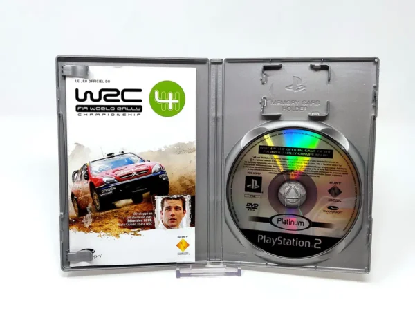 Interior del juego WRC 4: Le Jeu Officiel du FIA World Rally Championship (FRA) (Platinum) para PlayStation 2 con disco y manual
