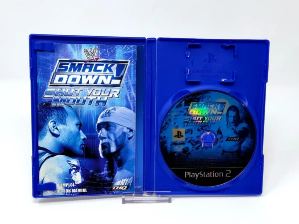 Interior del juego WWE SmackDown! Shut Your Mouth (FRA) para PlayStation 2 con disco y manual