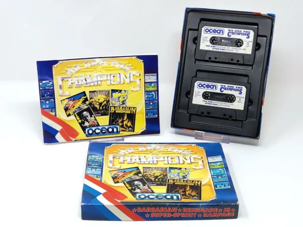 Interior del juego We Are the Champions (Ocean) para Sinclair ZX Spectrum con disco y manual