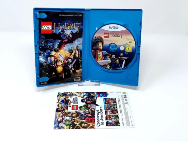Interior del juego LEGO The Hobbit (ESP) para Nintendo Wii U con disco y manual