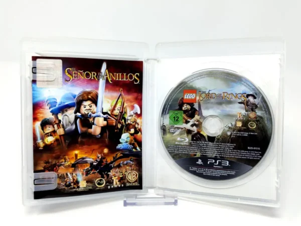 Interior del juego LEGO El Señor de los Anillos (ESP) para PlayStation 3 con disco y manual