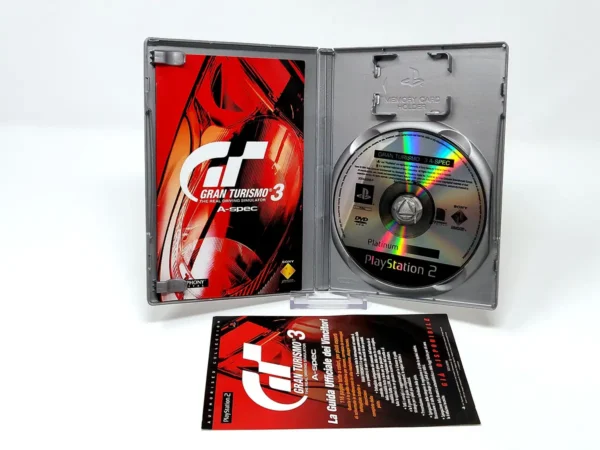 Interior del juego Gran Turismo 3: A-Spec (UK) (Platinum) para PlayStation 2 con disco y manual