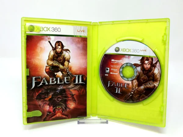 Interior del juego Fable II (ESP) para XBOX 360 con disco y manual