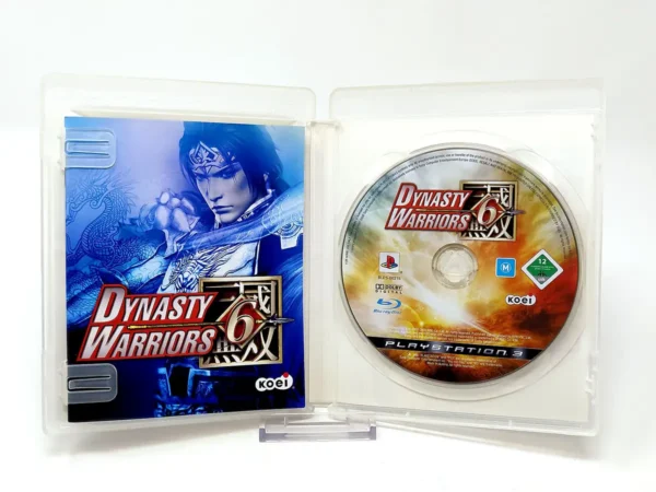 Interior del juego Dynasty Warriors 6 (ESP) para PlayStation 3 con disco y manual