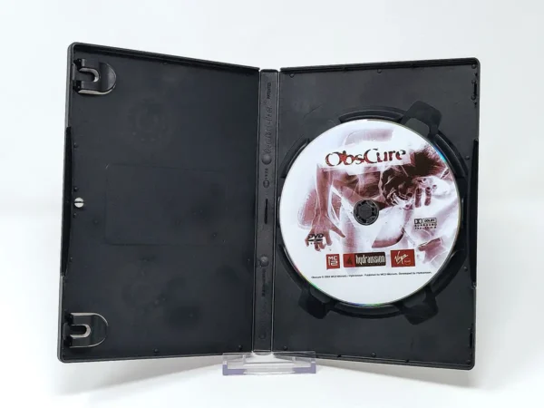 Interior del juego ObsCure (ESP) para PC con disco y manual