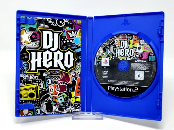 Interior del juego DJ Hero (EUR) para PlayStation 2 con disco y manual