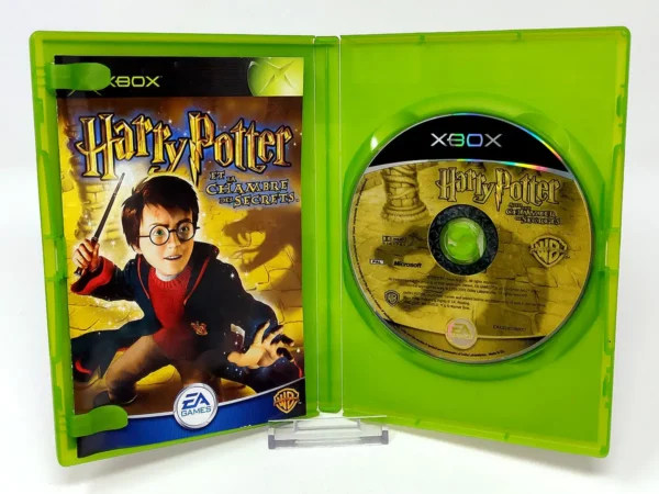 Interior del juego Harry Potter et la Chambre des Secrets (FRA) para XBOX con disco y manual