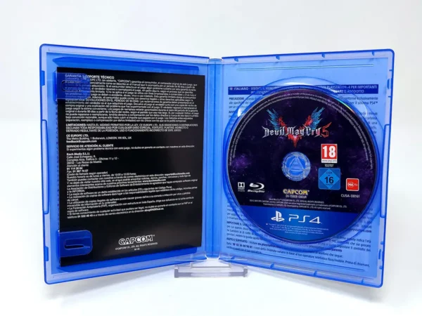 Interior del juego Devil May Cry 5 (ESP) para PlayStation 4 con disco y manual