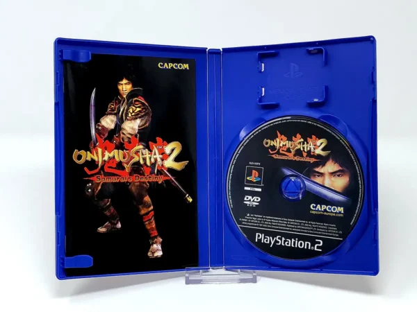 Interior del juego Onimusha 2: Samurai's Destiny (ESP) para PlayStation 2 con disco y manual