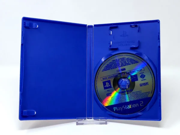 Interior del juego Ace Combat: The Belkan War (ESP) (Promo) para PlayStation 2 con disco y manual