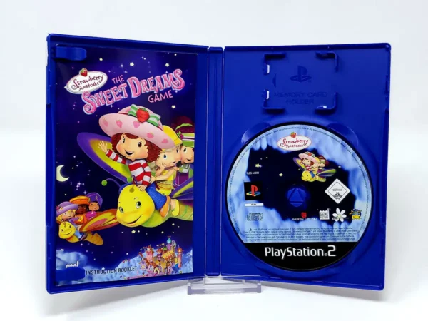 Interior del juego Strawberry Shortcake: The Sweet Dreams Game (UK) para PlayStation 2 con disco y manual