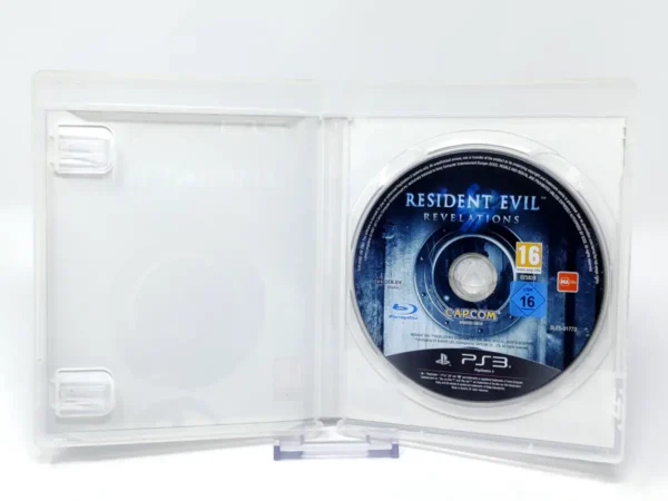 Interior del juego Resident Evil: Revelations (ESP) (Rebajado) para PlayStation 3 con disco y manual
