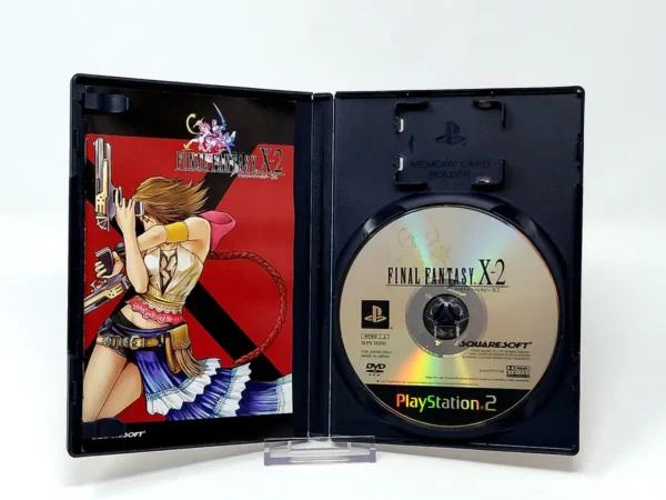 Interior del juego Final Fantasy X-2 (JAP) para PlayStation 2 con disco y manual