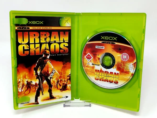 Interior del juego Urban Chaos: Riot Response (UK) para XBOX con disco y manual