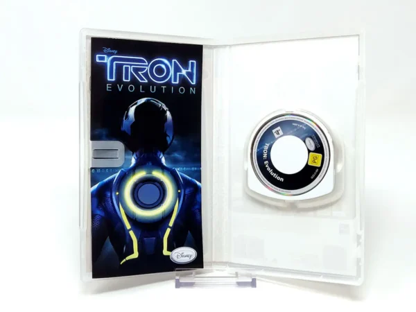 Interior del juego TRON: Evolution (ESP) (Essentials) para PSP con disco y manual
