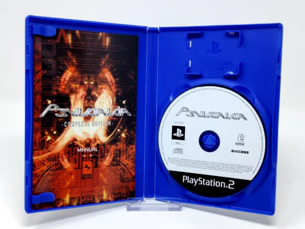 Interior del juego Psyvariar: Complete Edition (ESP) para PlayStation 2 con disco y manual