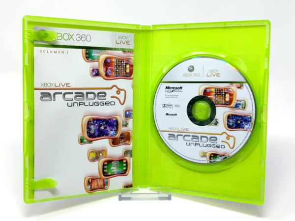 Interior del juego Xbox Live Arcade Unplugged Volume 1 (ESP) para XBOX 360 con disco y manual