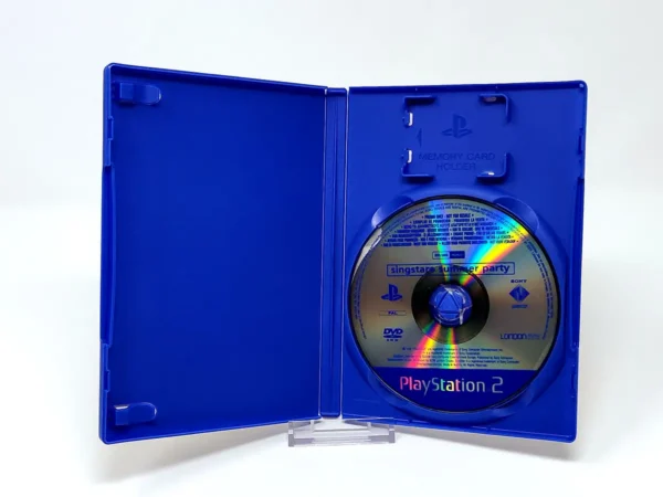 Interior del juego SingStar Summer Party (ESP) (Promo) para PlayStation 2 con disco y manual