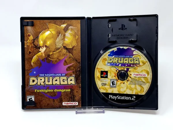 Interior del juego The Nightmare of Druaga: Fushigino Dungeon (USA) para PlayStation 2 con disco y manual