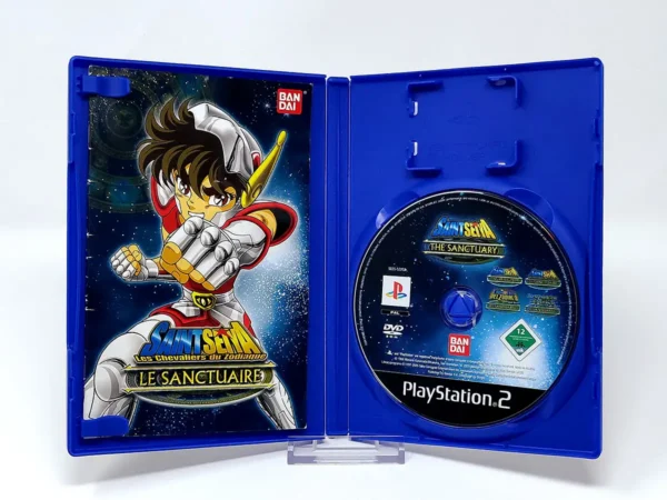 Interior del juego Saint Seiya: Les Chevaliers du Zodiaque - Le Santuaire (FRA) para PlayStation 2 con disco y manual