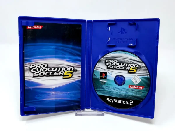 Interior del juego Pro Evolution Soccer 5 (ESP) para PlayStation 2 con disco y manual