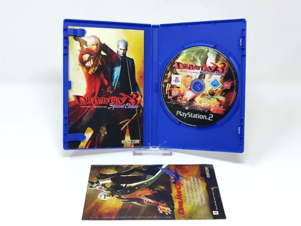 Interior del juego Devil May Cry 3: Dante's Awakening (Special Edition) (ESP) (Versión 2) para PlayStation 2 con disco y manual