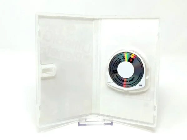 Interior del juego LittleBigPlanet (ESP) (Promo) para PSP con disco y manual
