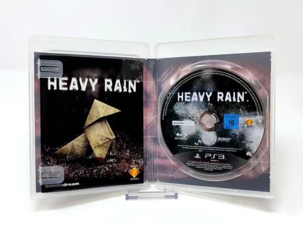 Interior del juego Heavy Rain (ESP) para PlayStation 3 con disco y manual