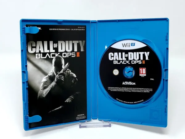 Interior del juego Call of Duty: Black Ops II (ESP) para Nintendo Wii U con disco y manual