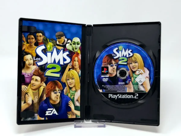 Interior del juego Los Sims 2 (ESP) para PlayStation 2 con disco y manual