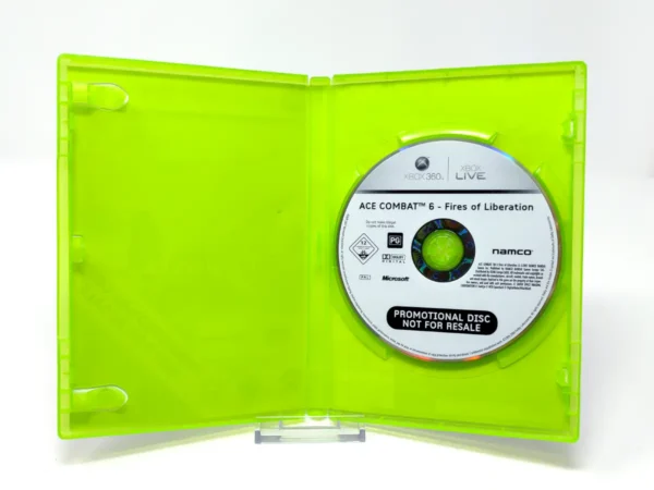 Interior del juego Ace Combat 6: Fires of Liberation (UK) (Promo) para XBOX 360 con disco y manual