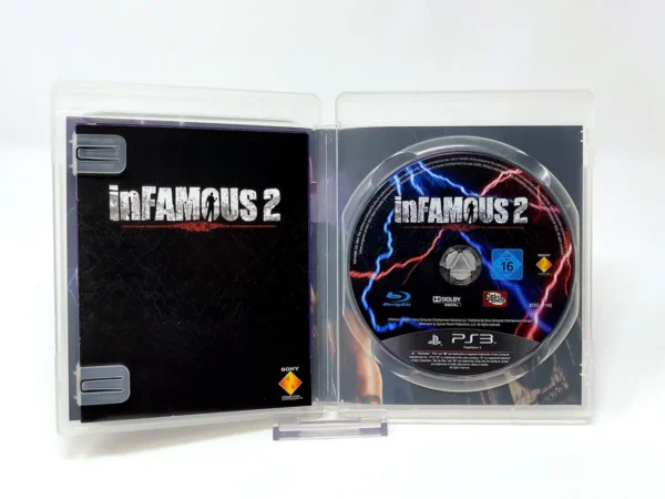 Interior del juego inFamous 2 (ESP) para PlayStation 3 con disco y manual
