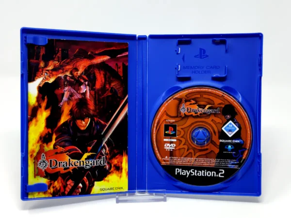 Interior del juego Drakengard (ALE) para PlayStation 2 con disco y manual