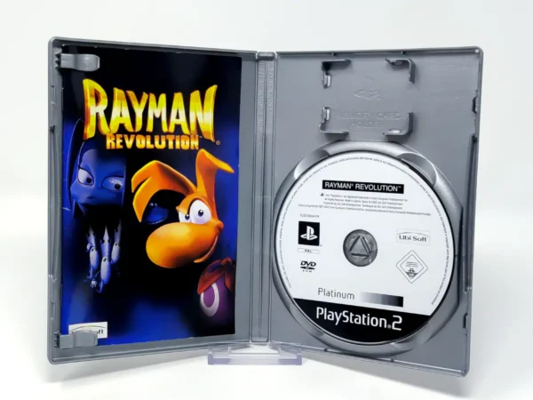 Interior del juego Rayman Revolution (ESP) (Platinum) para PlayStation 2 con disco y manual