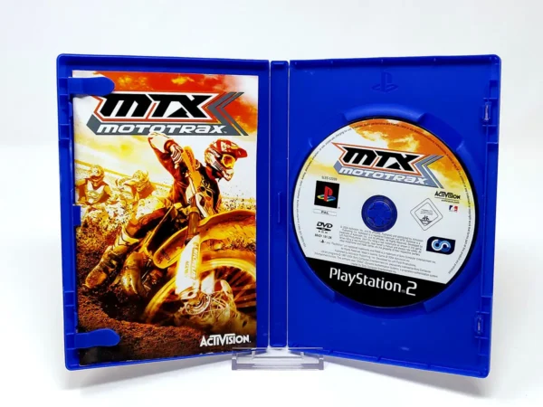 Interior del juego MTX Mototrax (ESP) para PlayStation 2 con disco y manual