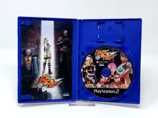 Interior del juego The King of Fighters: Maximum Impact (FRA) para PlayStation 2 con disco y manual