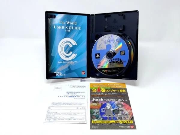 Interior del juego .Hack//Mutation: Vol.2 (JAP) para PlayStation 2 con disco y manual