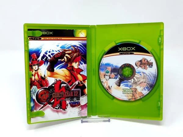 Interior del juego Guilty Gear X2 #Reload: The Midnight Carnival (ESP) para XBOX con disco y manual