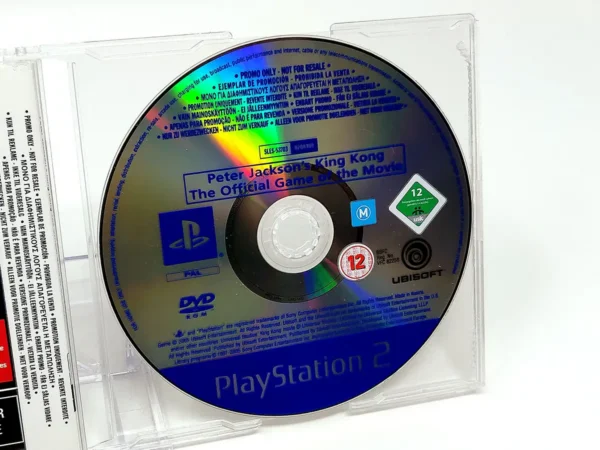 Interior del juego Peter Jackson's King Kong: The Official Game of the Movie (UK) (Promo) para PlayStation 2 con disco y manual