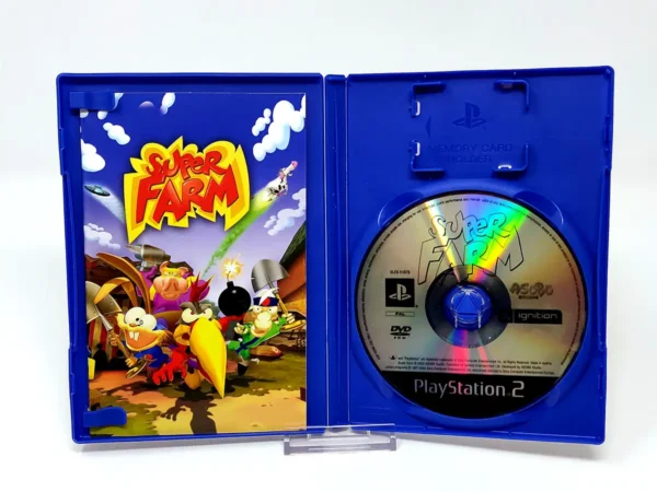 Interior del juego Super Farm (FRA) para PlayStation 2 con disco y manual