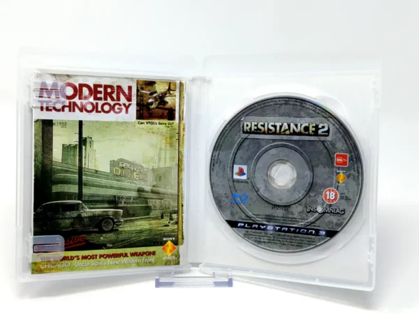 Interior del juego Resistance 2 (ESP) para PlayStation 3 con disco y manual