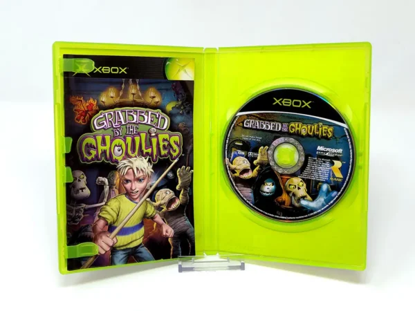 Interior del juego Grabbed by the Ghoulies (UK) para XBOX con disco y manual