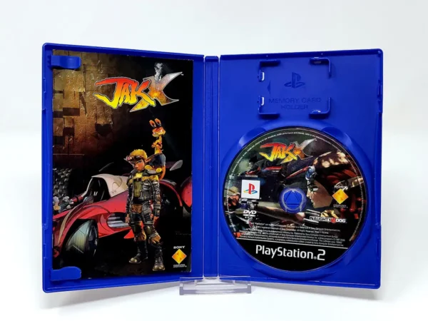 Interior del juego Jak X (ITA) para PlayStation 2 con disco y manual