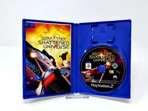 Interior del juego Star Trek: Shattered Universe (UK) para PlayStation 2 con disco y manual
